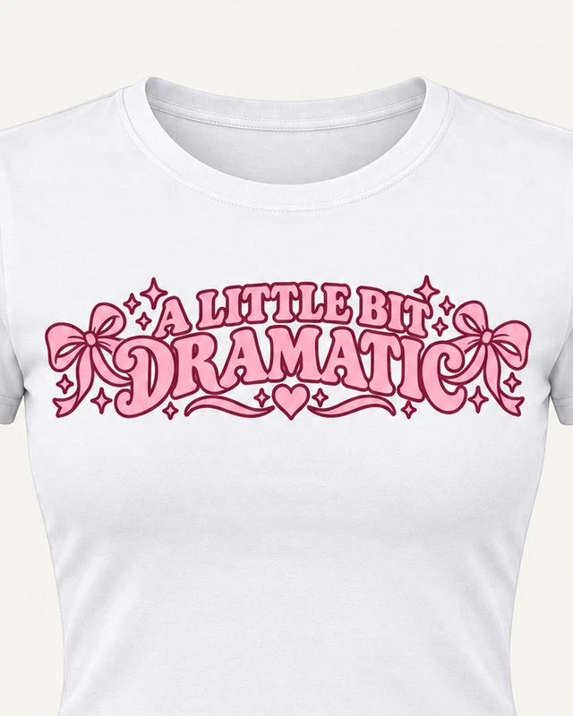 A Little Bit Dramatic Graphic Crop Top in White — cropped design detail