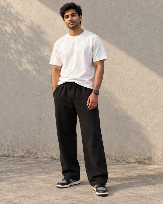 Essential Loose Fit Sweatpants in Black — Model front