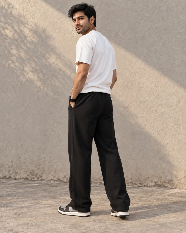 Essential Loose Fit Sweatpants in Black — Back view