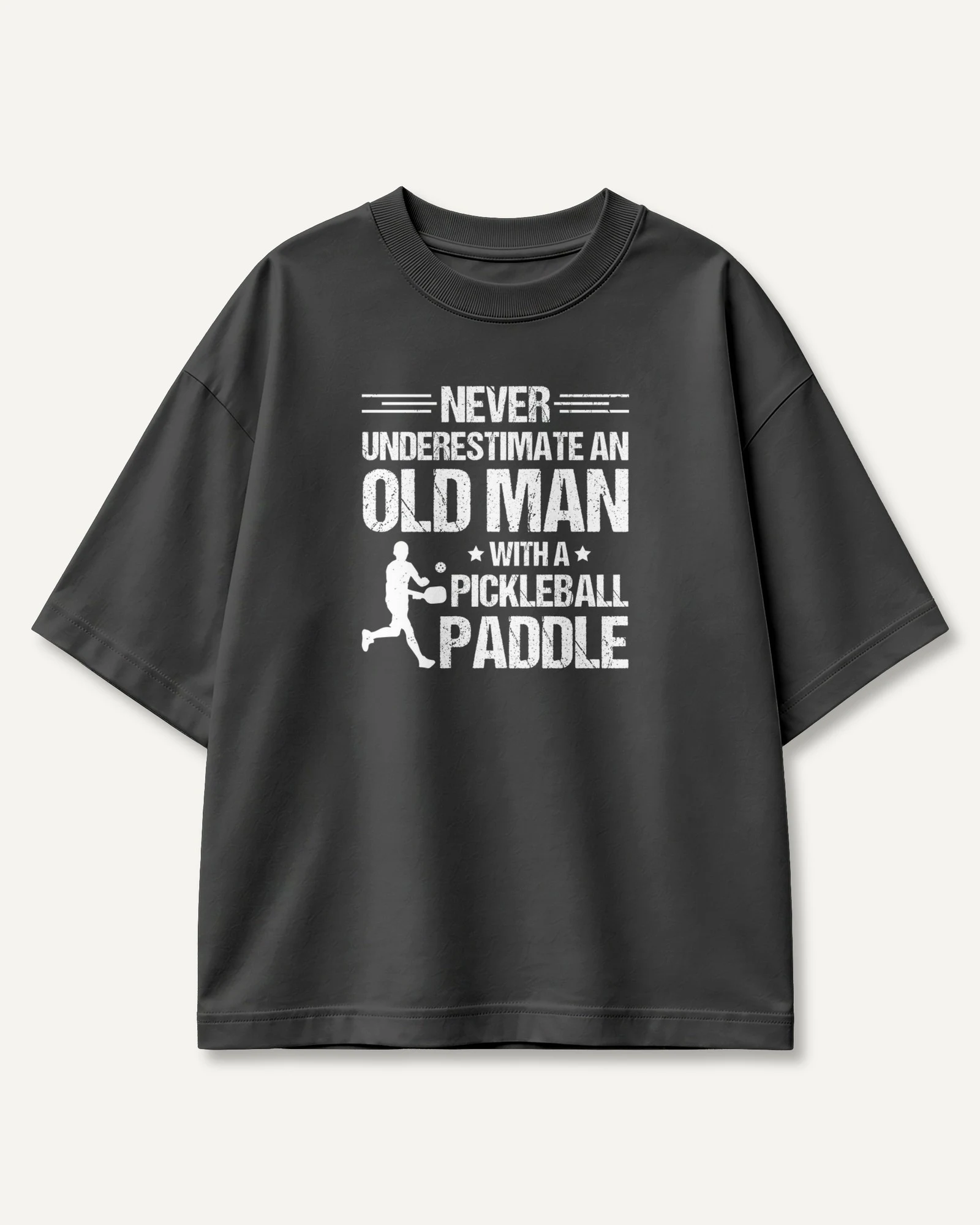 Never Underestimate an Old Man with a Pickleball Paddle Oversized T-Shirt in Black — front Never Underestimate an Old Man with a Pickleball Paddle Oversized T-Shirt in Black — front