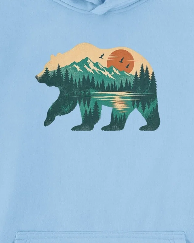 Mountain Forest Bear Graphic Hoodie in Baby Blue — cropped design detail