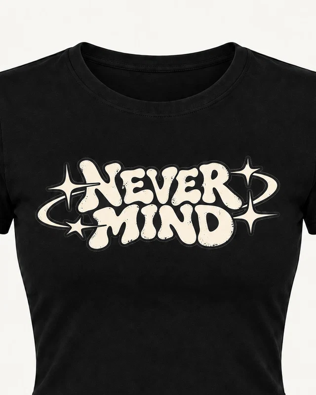 Never Mind Graphic Crop Top in Black — cropped design detail