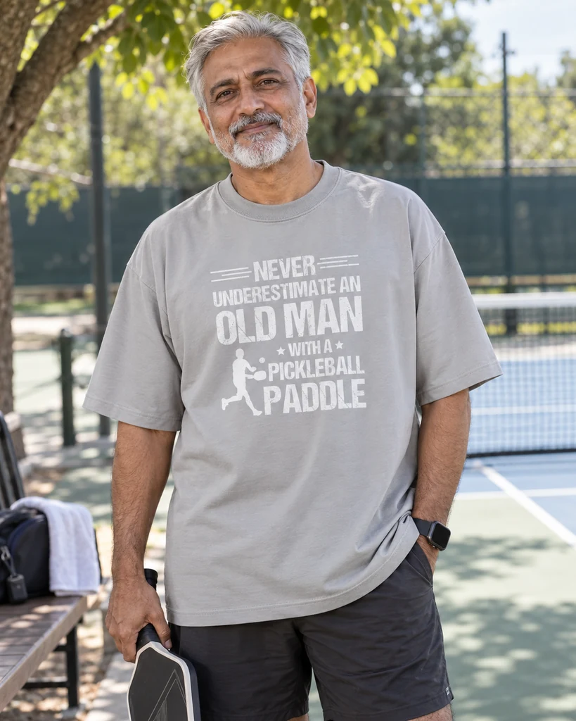 Never Underestimate an Old Man with a Pickleball Paddle Oversized T-Shirt in Grey Melange — Pickleball