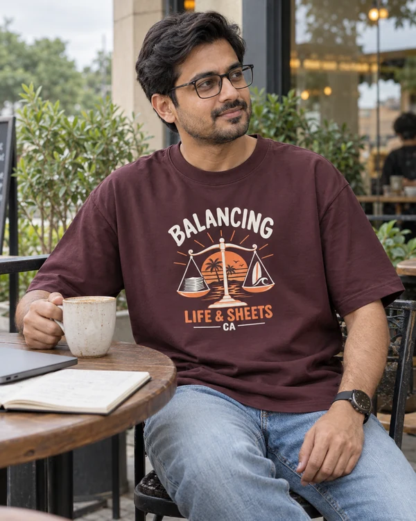 Balancing Life and Sheets Oversized T-Shirt in Maroon — Indian lifestyle photo