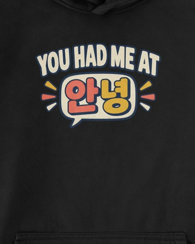 You Had Me at Annyeong Graphic Hoodie in Black — cropped design detail